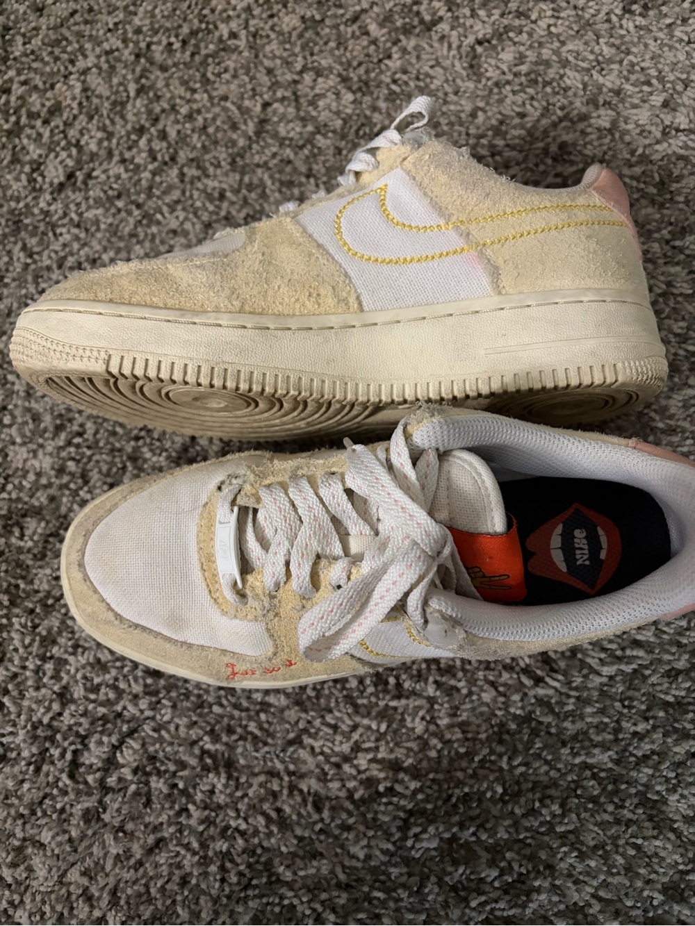 Nike Cream Canvas Sneaker with Yellow Swoosh and Orange Accents